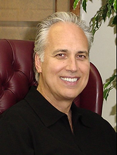 Dr. David M. Mastro, DDS, in his office