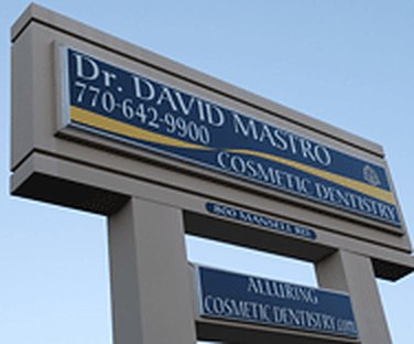 Navy and gold Dr. David Mastro roadside sign